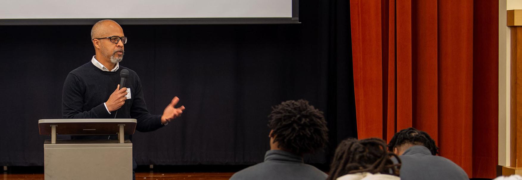 Professor Gabby Yearwood speaks at an American Apartheid City event